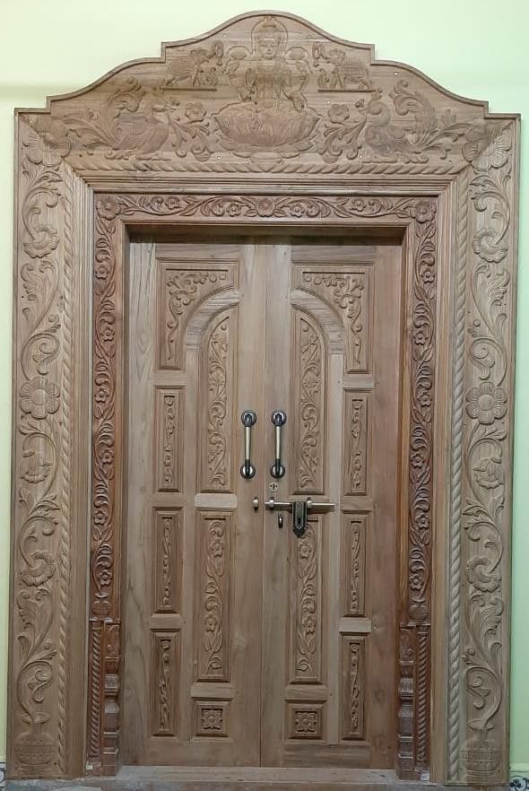 Real wooden door fitted in a home — finished wood grain door project